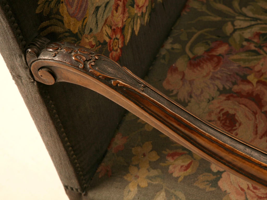 Without exercising any restraint, the maker of these fine chairs was an obvious skilled craftsman. Sweeping arms, graceful aprons, and wavy 