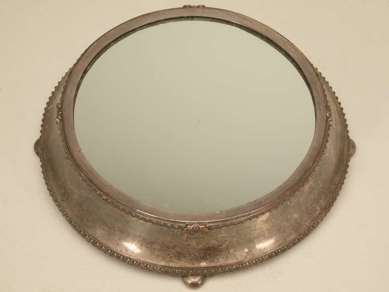 A true showstopper, this wonderful Sheffield Plated mirror plateau is in great shape, especially being well over 100 years old. The mirror is not new, nor is it original. That is the only thing negative I can say. Well known for their abilities,