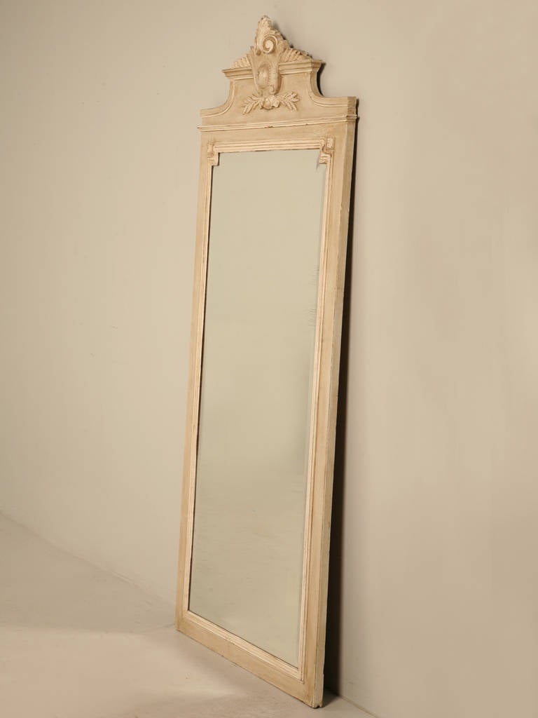 French mirror with the original glass, circa 1880-1900. We purchased this in the English Midlands and the antique dealer told us she had done the paintwork, so I do not want anyone thinking this is original paint, but it clearly is a French color