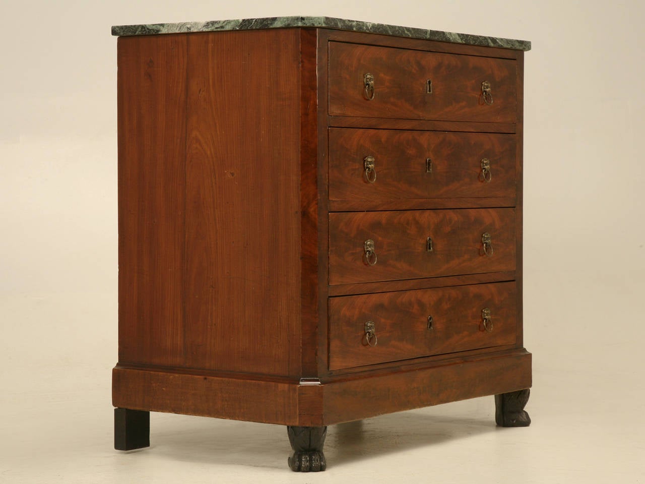 Petite antique French commode, or if you prefer chest of drawers that is wonderfully scaled and small enough to be used as a nightstand, or in an entry- hall. Either way, the scale makes it work almost anywhere and who doesn’t love the hand carved