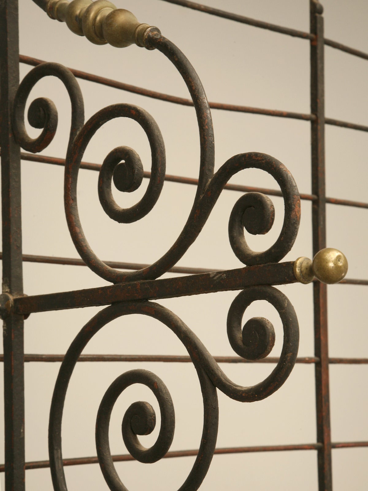 Turn of the century authentic French Baker's Rack made in Paris. We left the rack exactly as received and although it is tempting to polish the brass, we did not want it to look like a reproduction. Should you prefer the brass polished, we would be