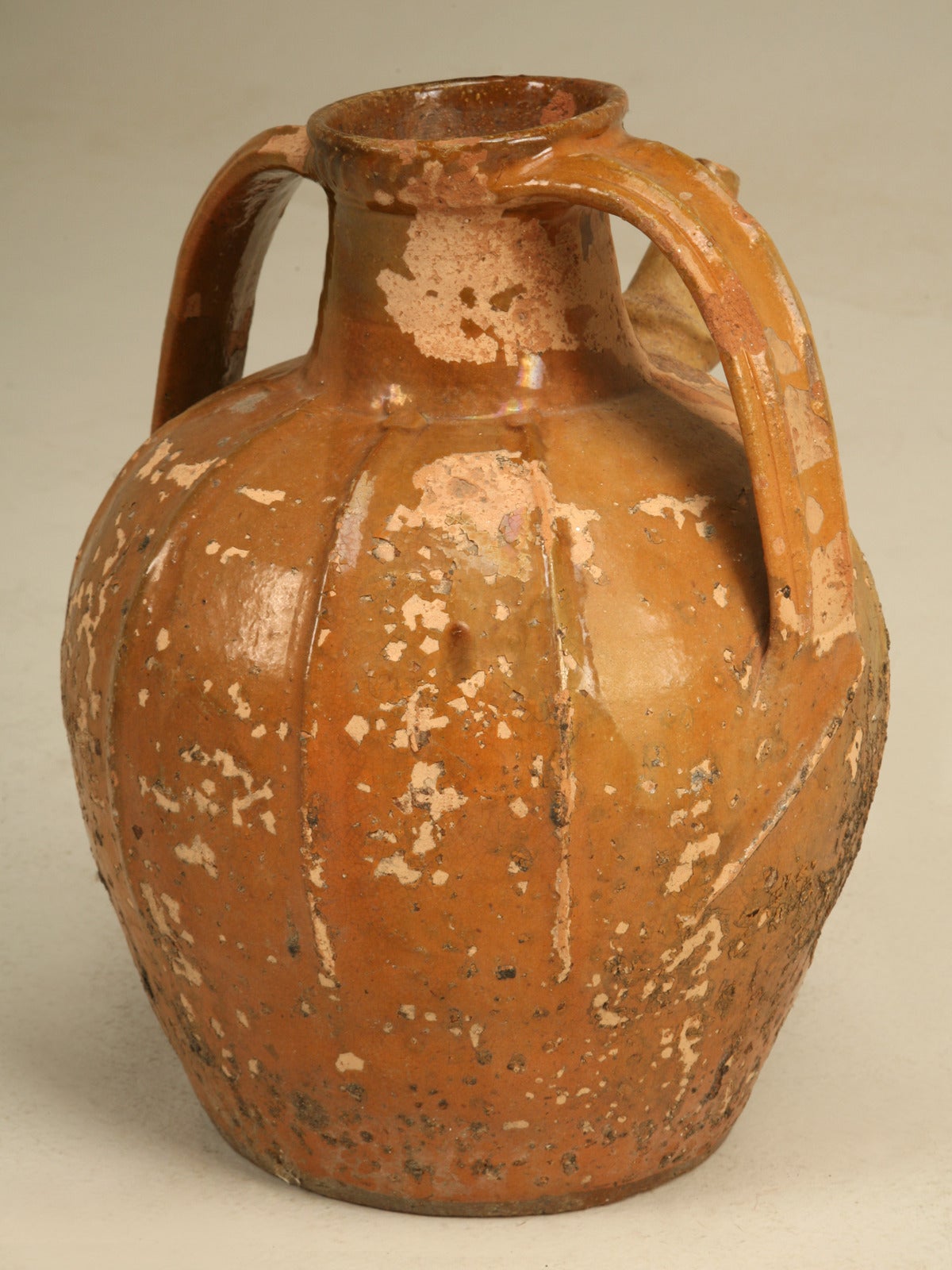 I have to confess to being a true old French pottery junkie. Whenever I find these wonderful old worn water jugs from the 1700 and 1800s, I cannot resist purchasing them. Whether you place the jug on a kitchen counter top, or above a cabinet they