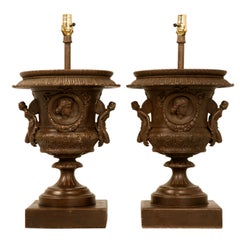 Magnificent Pair of Italian Iron Winged Maidens Urns Fitted as Lamps