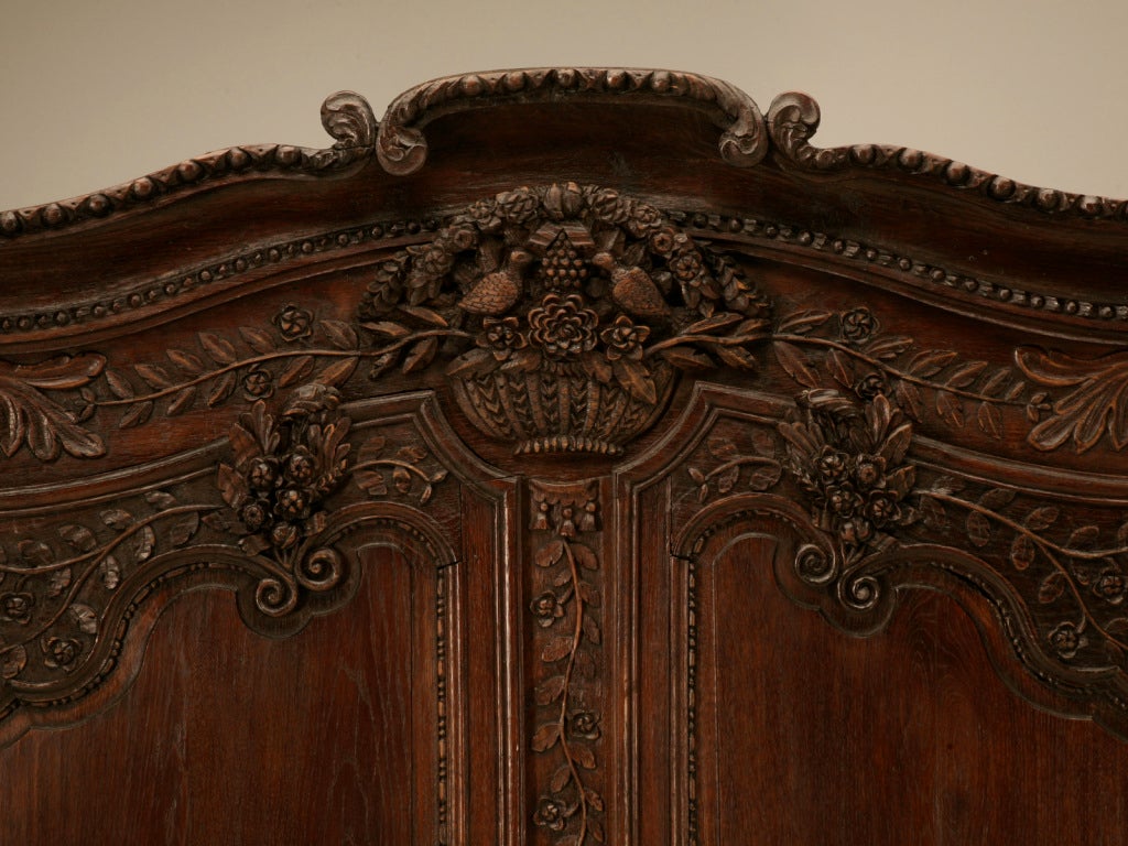 18th C. Heavily Carved Antique French Normandy Wedding Armoire In Excellent Condition In Chicago, IL