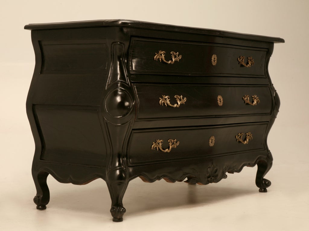 Classic styling gives this commode a fine appearance, while the timelessness of the ebonized finish takes it off the charts. Perfect in so many places, commodes such as this not only provide a plethora of good storage but, their overall appearance