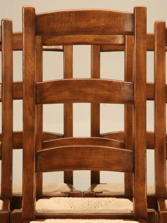 Constructed the old-fashioned way, these chairs were made to last a lifetime. Classic French style combined with gorgeous (and comfortable) rush seats give these chairs the usefulness to be utilized as either casual or formal dining chairs. Whether