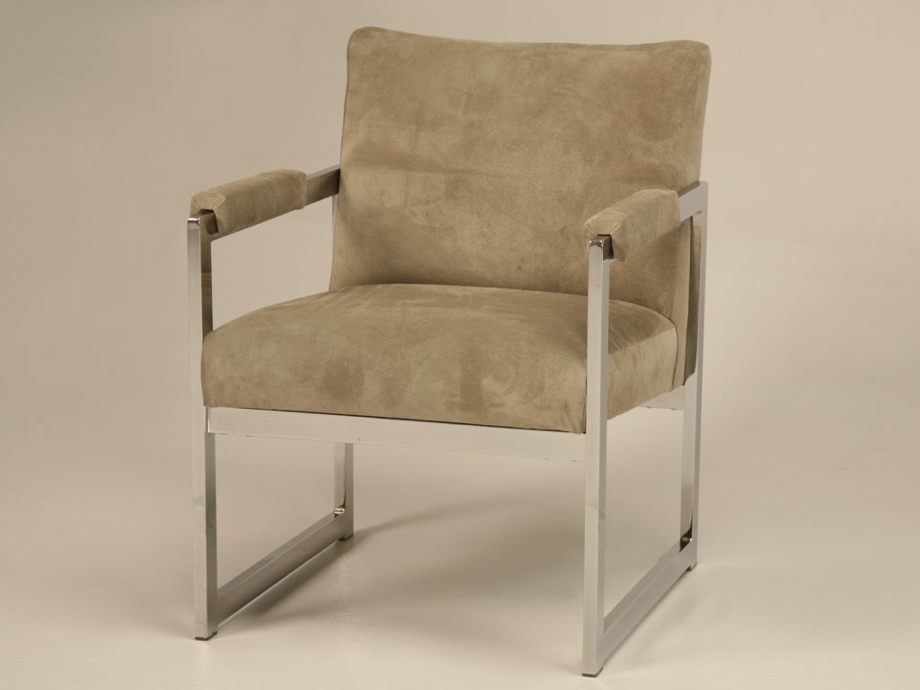 Pair of Milo Baughman for Thayer Coggin Chairs. Absolutely incredible pair of square mirror finished chrome armchairs with new greenish gray authentic suede leather upholstery. These fine chairs deserved restoration, the frames were and are
