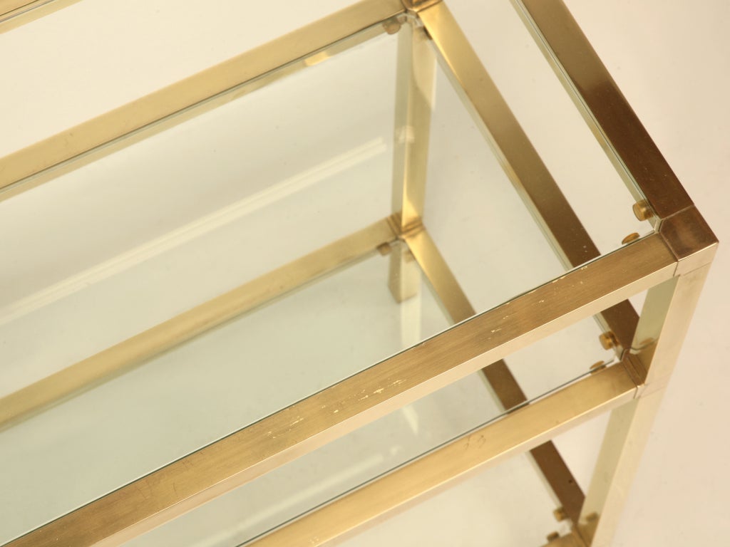 brass and glass console table