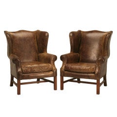 Outstanding Pair of Vintage Distressed Bomber Leather Wing Back Chairs