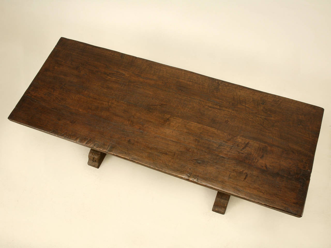 Antique French farm or trestle table made from white oak in the late 1800’s and just completely rebuilt by our in house shop. One of the benefits of a trestle design table is that you can comfortably seat 8 at this six and a half foot table, where