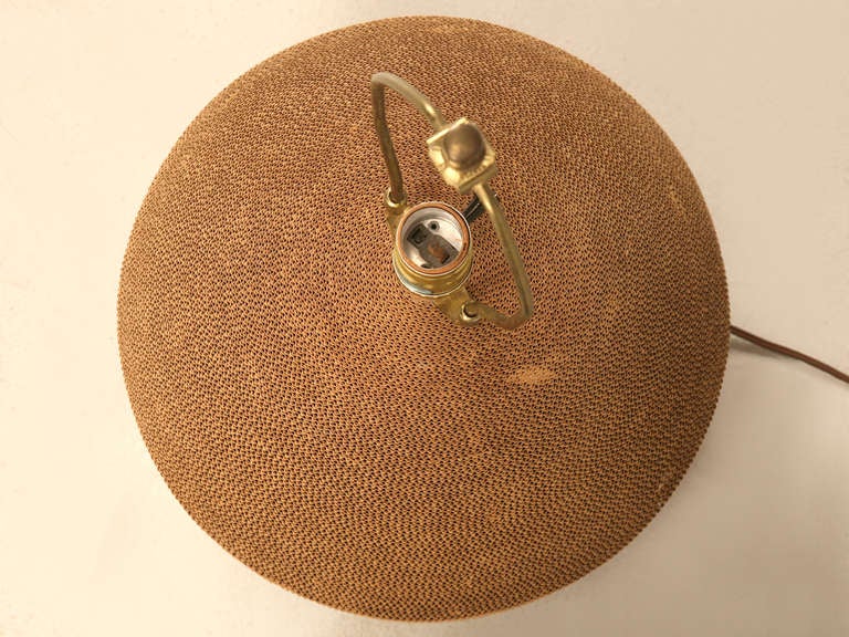 Mid-Century Modern Incredible vintage corrugated cardboard sphere shaped Table Lamp. This Classic retro Table Lamp offers stunning good looks mated to mid-century charm. Probably from the 1960s or 1970s, this Lamp will look ultra cool and groovy in