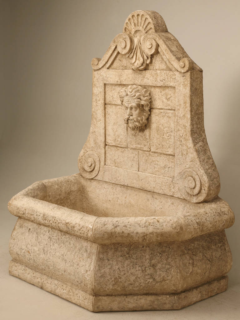 Reproduction 18th century French style fountain imported from England during the 1990s. This is a functional fountain made from fiberglass to look like French limestone, but will not crack in the cold climates.