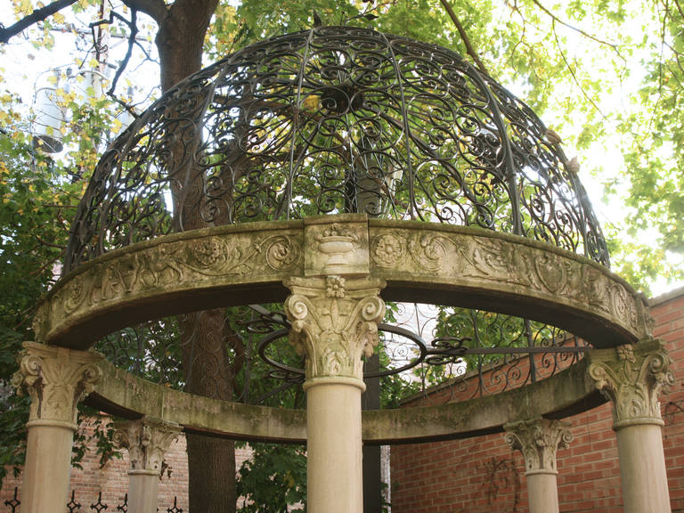 This particular gazebo has been residing in the backyard of a Chicago gold coast home since 1885. The dome is composed of four pieces, so yes it can be broken down and crated for shipping. You will however require the services of a stone mason to