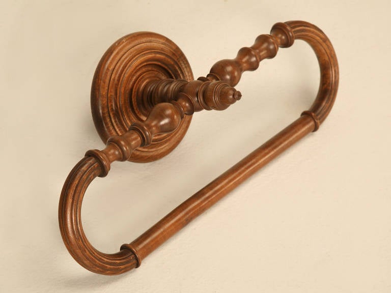 Vintage French wooden towel bar, that on first appearance seems to be walnut, but upon closer inspection we think it may have been produced from a fruitwood. Extremely functional and will accommodate a very large towel, or multiple small ones.