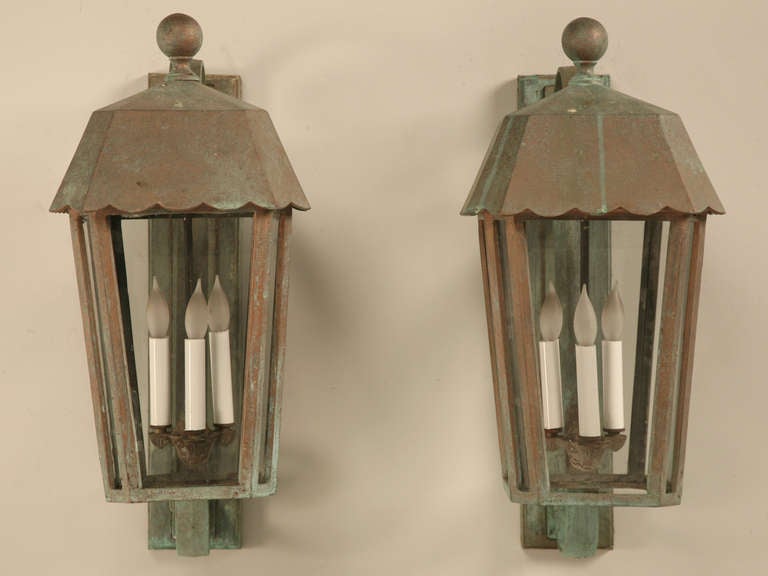 Great scale on these beautiful sconce style wall lights. Each with a 3 bulb cluster, these lights would be perfect indoors or out. With a total of 9 available, you can easily light the perimeter of your home, swimming pool or stairwell. These lights