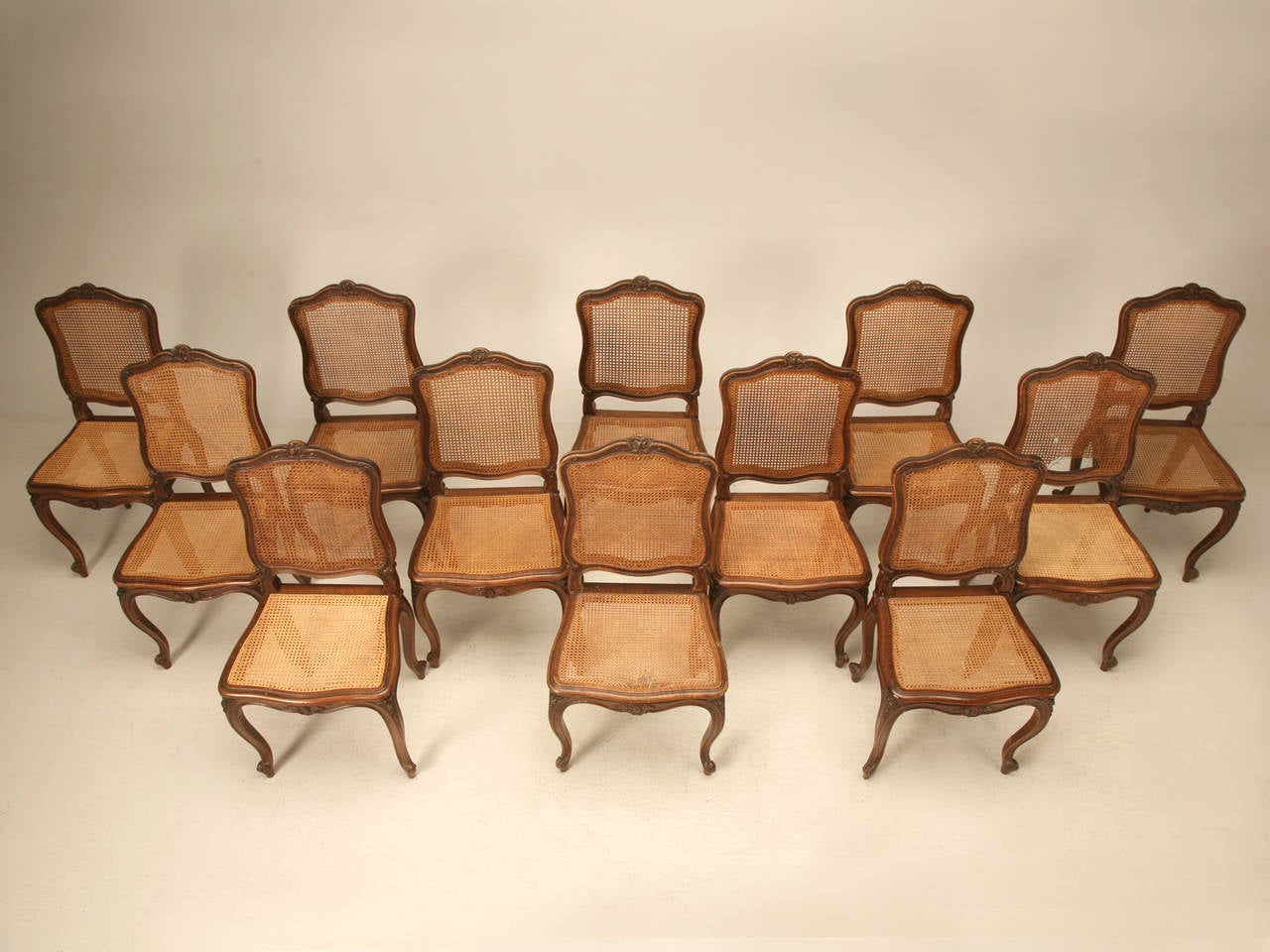 Late 19th Century Rare Set of Twelve Matching Louis XV Style Walnut Dining Chairs