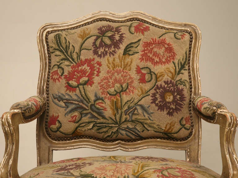 Nicely scaled pair of antique Italian armchairs, lead us to believe they were commissioned for an upper class family where bustles were in fashion. Very practical nowadays, as folks are larger than they once were. These chairs offer comfort and