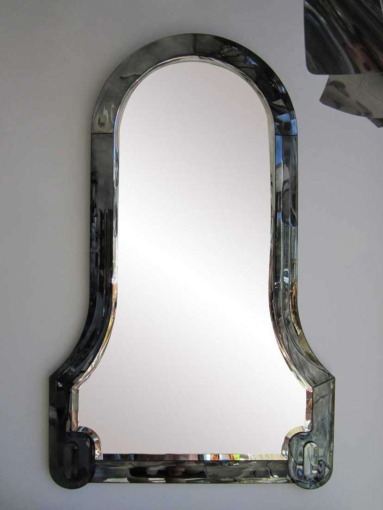 Italian mirror with smoky aubergine tint on decorative edge.  Both inner mirror and outer edge are beveled.