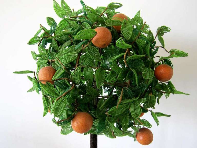 Pair of orange trees made of  hand wired orange translucent glass beads over wire armature.