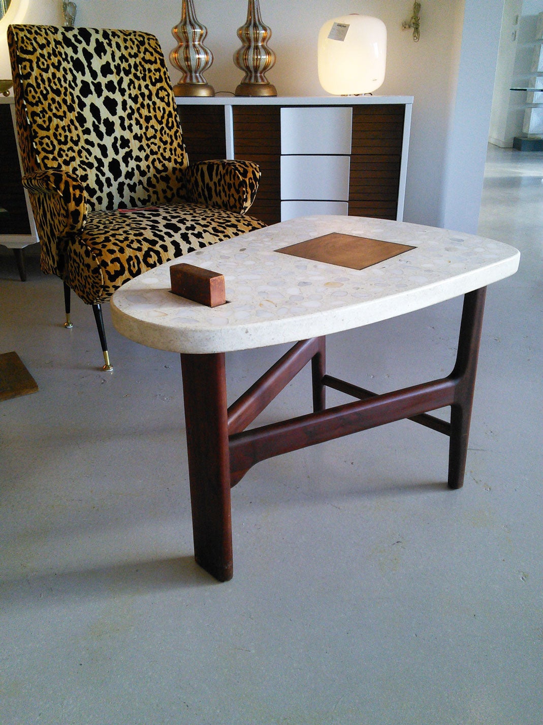 Harvey Probber terrazzo and walnut occasional table with intersecting walnut design.