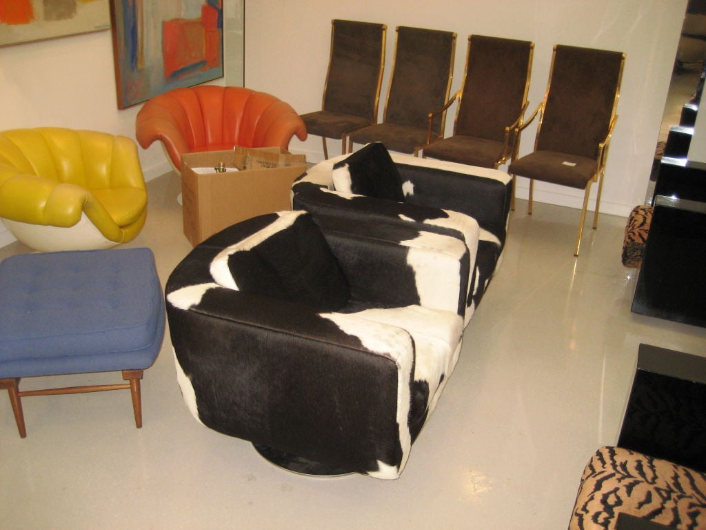 20th Century Pair of Cowhide Swivel Chairs with Chrome Base