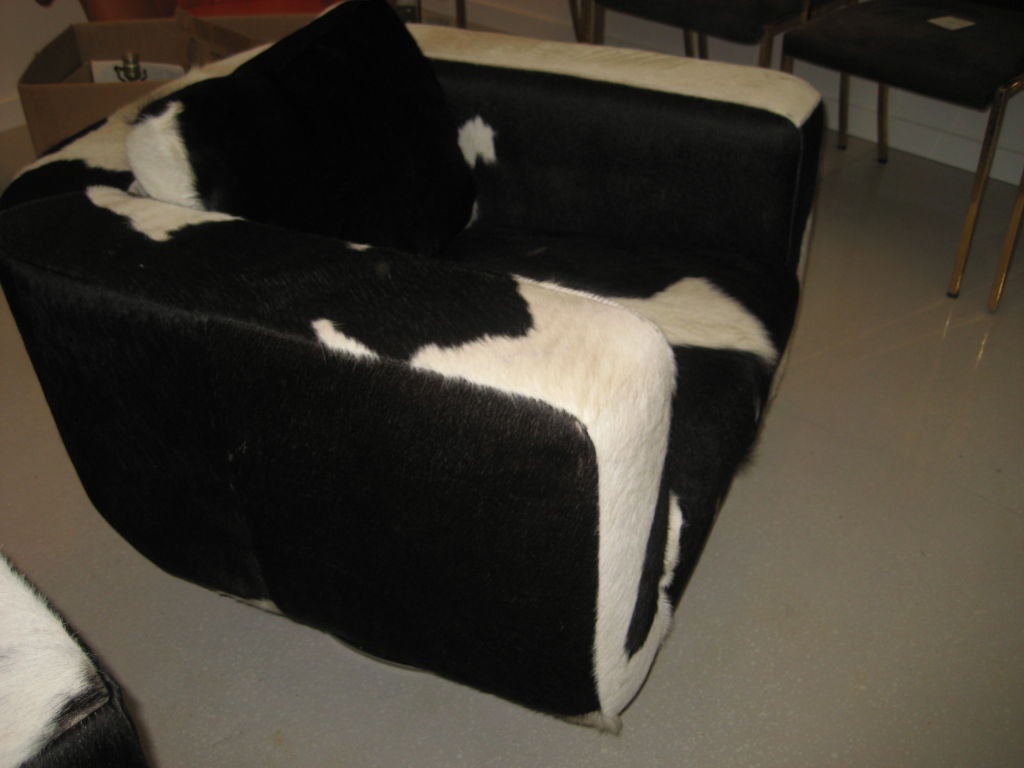 Pair of Cowhide Swivel Chairs with Chrome Base 1