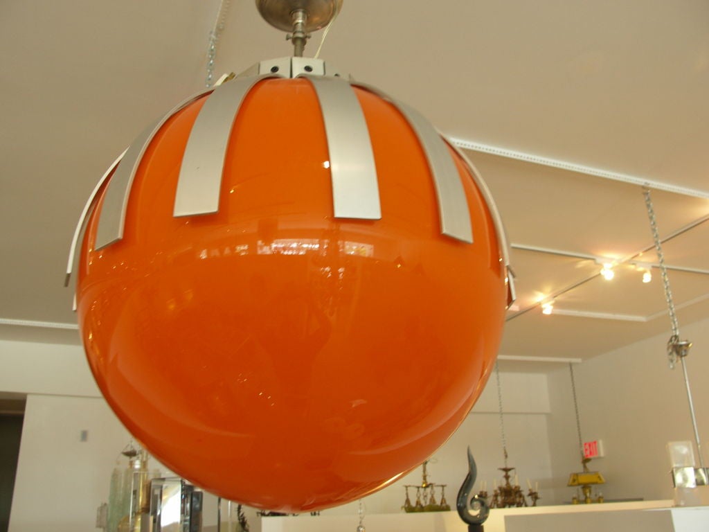Giant orange glass light fixture made in Murano Italy by the designer Vistosi