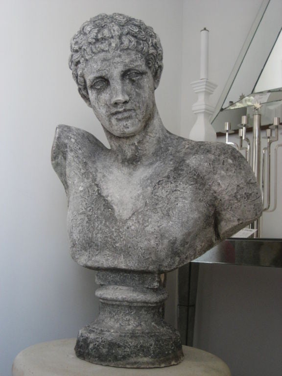 Large classical male bust made of concrete- attractive from all angles. May be placed indoors or out.