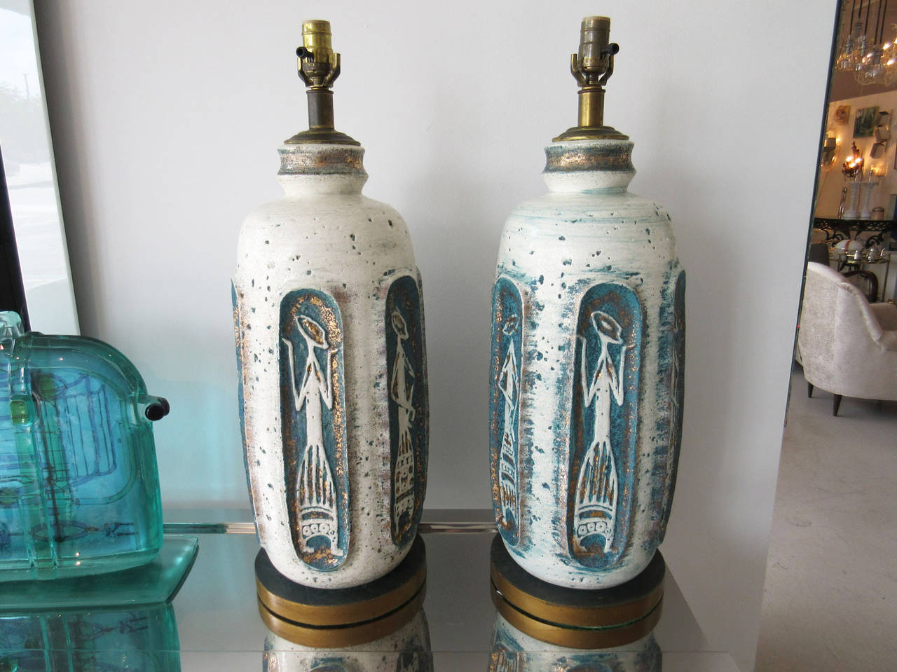 Pair of ceramic lamps in a tribal or Egyptian style signed by American artist 