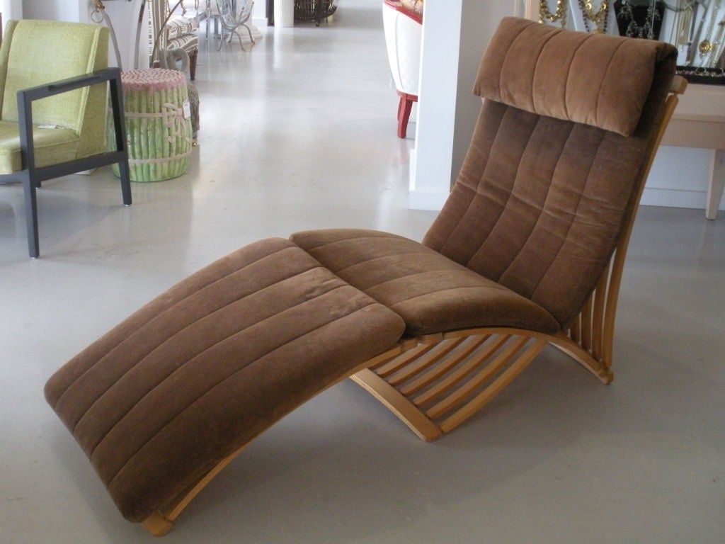 Steam bent mabau teak lounge chair by Canadian designer Thomas Lamb (1938-1997). The chair design is inspired by steamship deck chairs. It has a removeable original cushion and the ottoman is detachable.