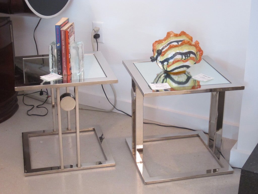 Pair of D.I.A. nickel plated geometric side tables restored with original mirror tops.