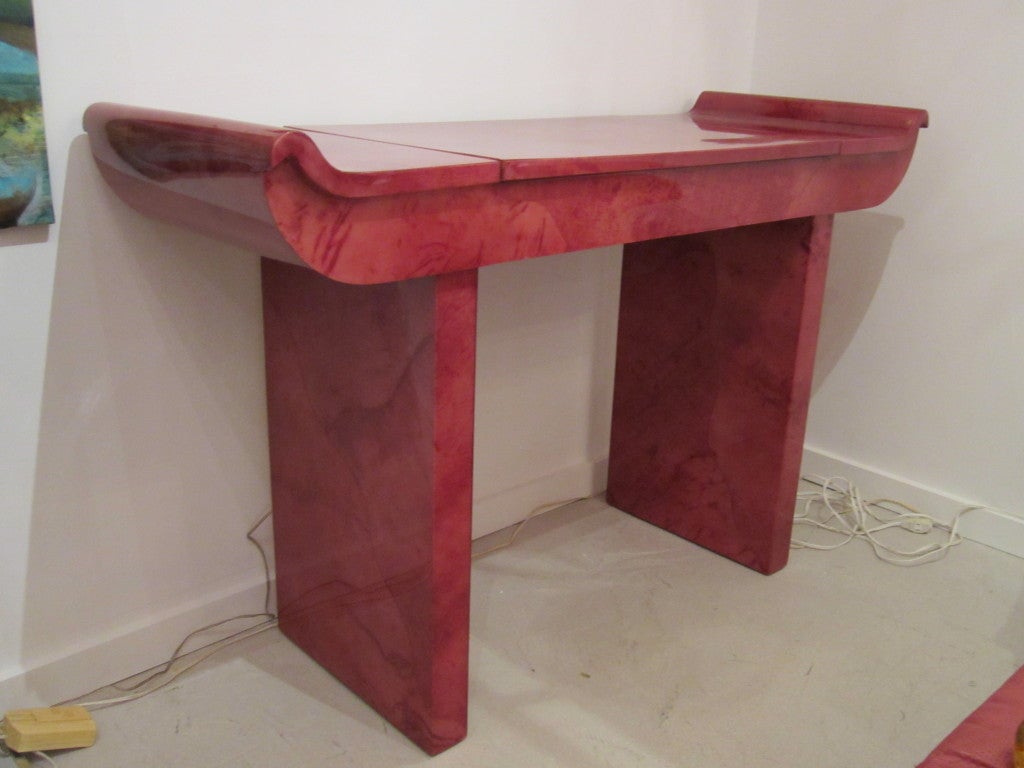 Enrique Garces goatskin console table with flip top mirrored vanity.