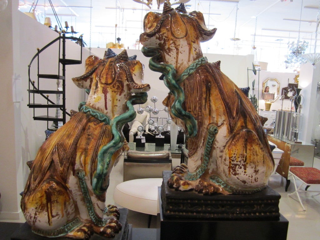 Pair of gigantic Foo dogs- with colorful palette- turquoise red green and amber