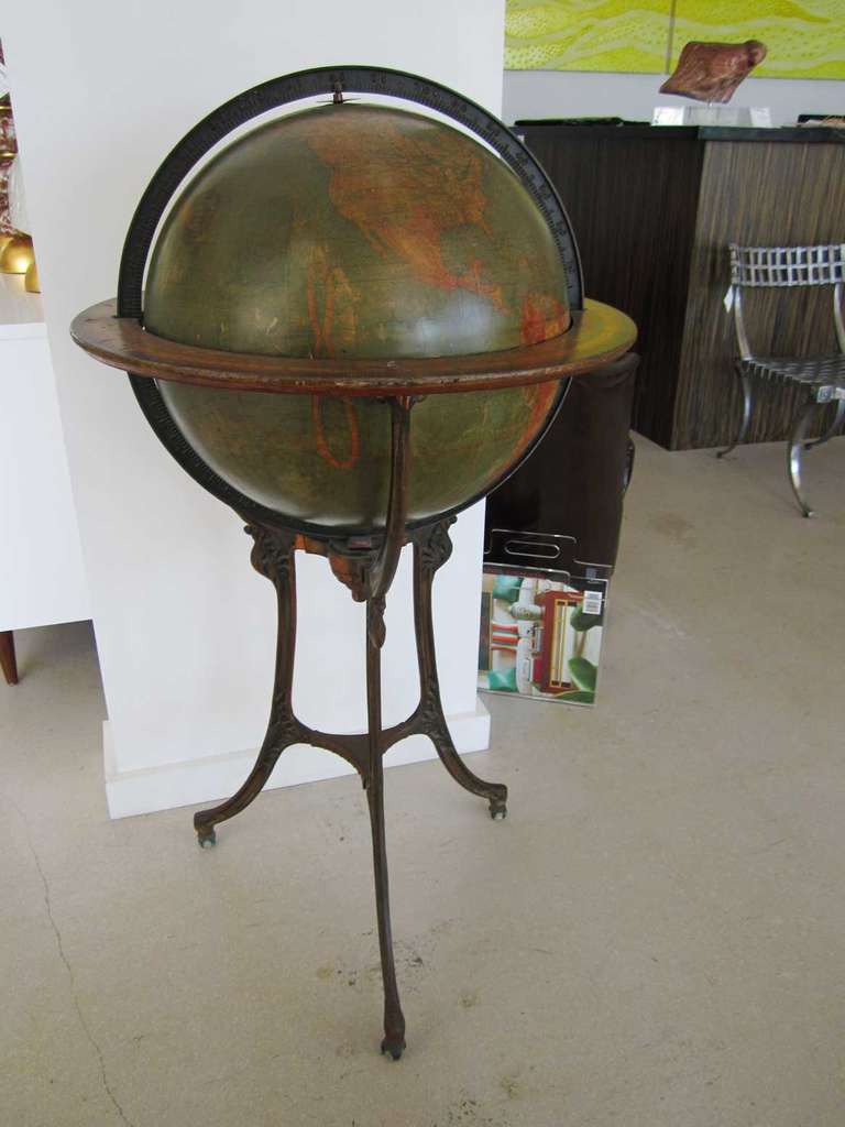 Antique Hammond Terrestrial globe on brass Victorian base with glass castors.