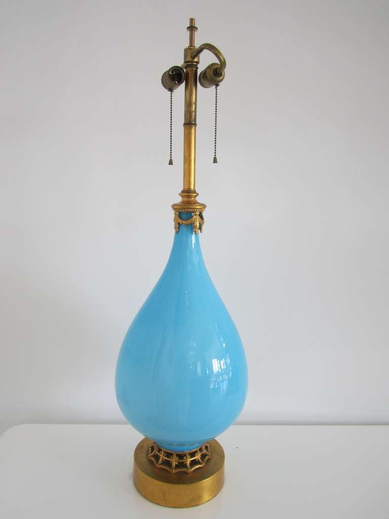 Large pair of vintage blue Murano glass lamps with gold gilt detail and bases.