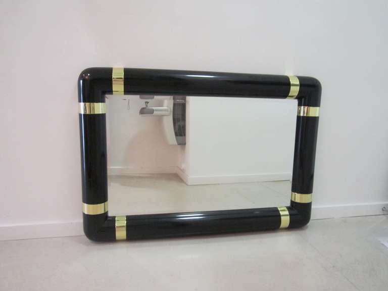 Unknown Lacquer Mirror with Brass Strap Motif
