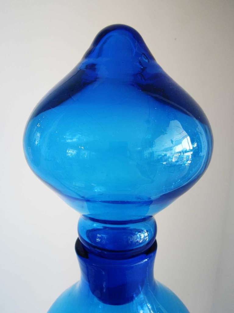 Tall architectural scale organic shaped cobalt blue decanter with complimentary stopper by Blenko.