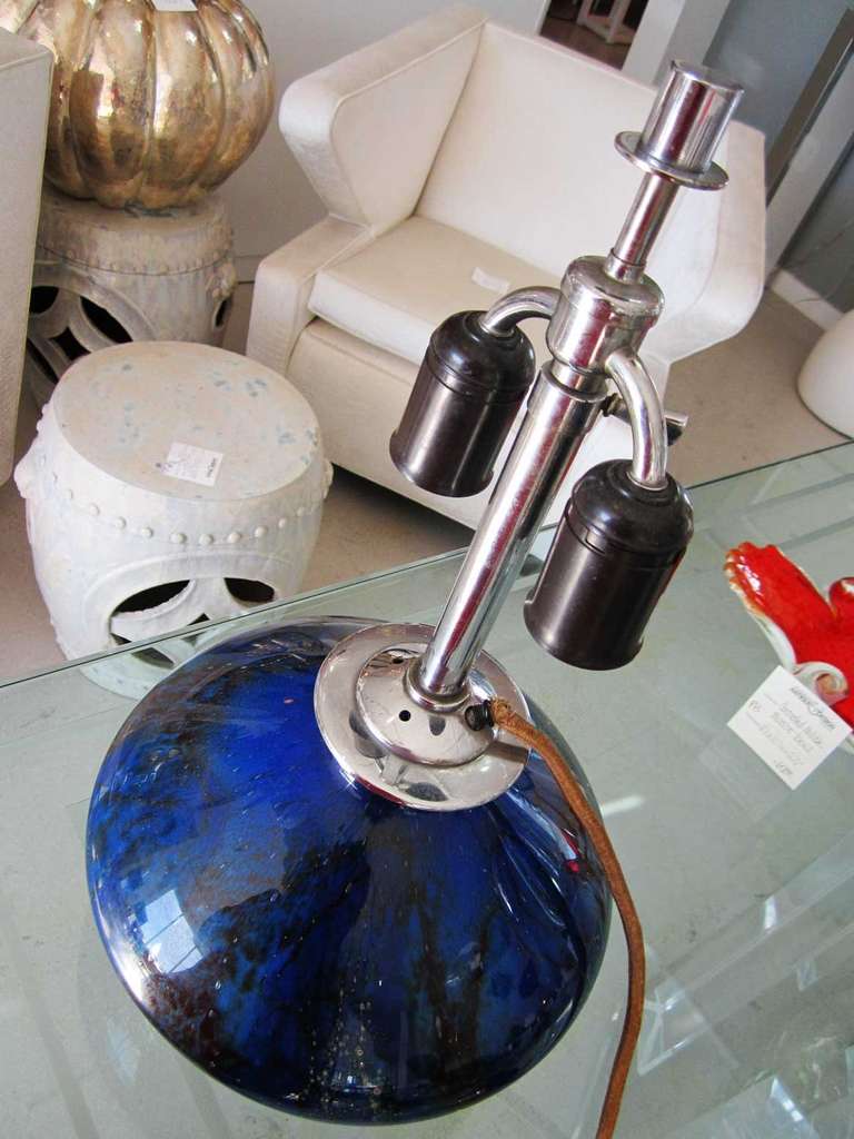Rare WMF Ikora blue lamp with two sockets externally and one socket that lights the lamp internally.

Wired for European Standards