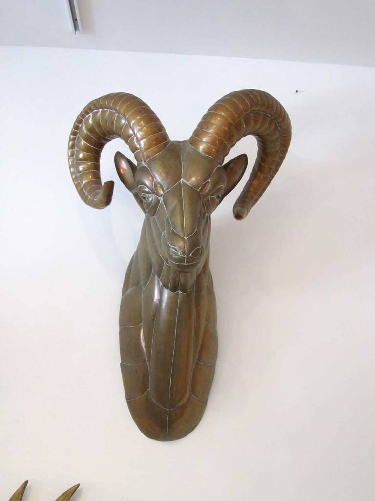 Large mixed metal ram trophy wall mount sculpture by Mexican artist Sergio Bustamante. Highly collectible in this scale, the ram is one of many Bustmante animals we offer for sale.