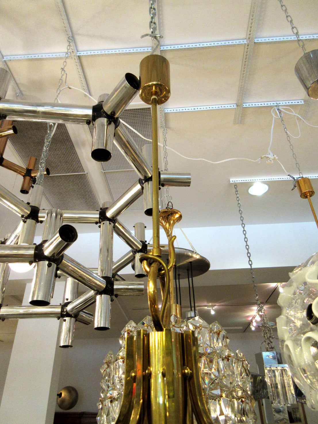 Vintage Kalmar chandelier with brass hardware and thick glass cubes that radiate around the circumference. There are eight sockets in total. Wired for European standards.