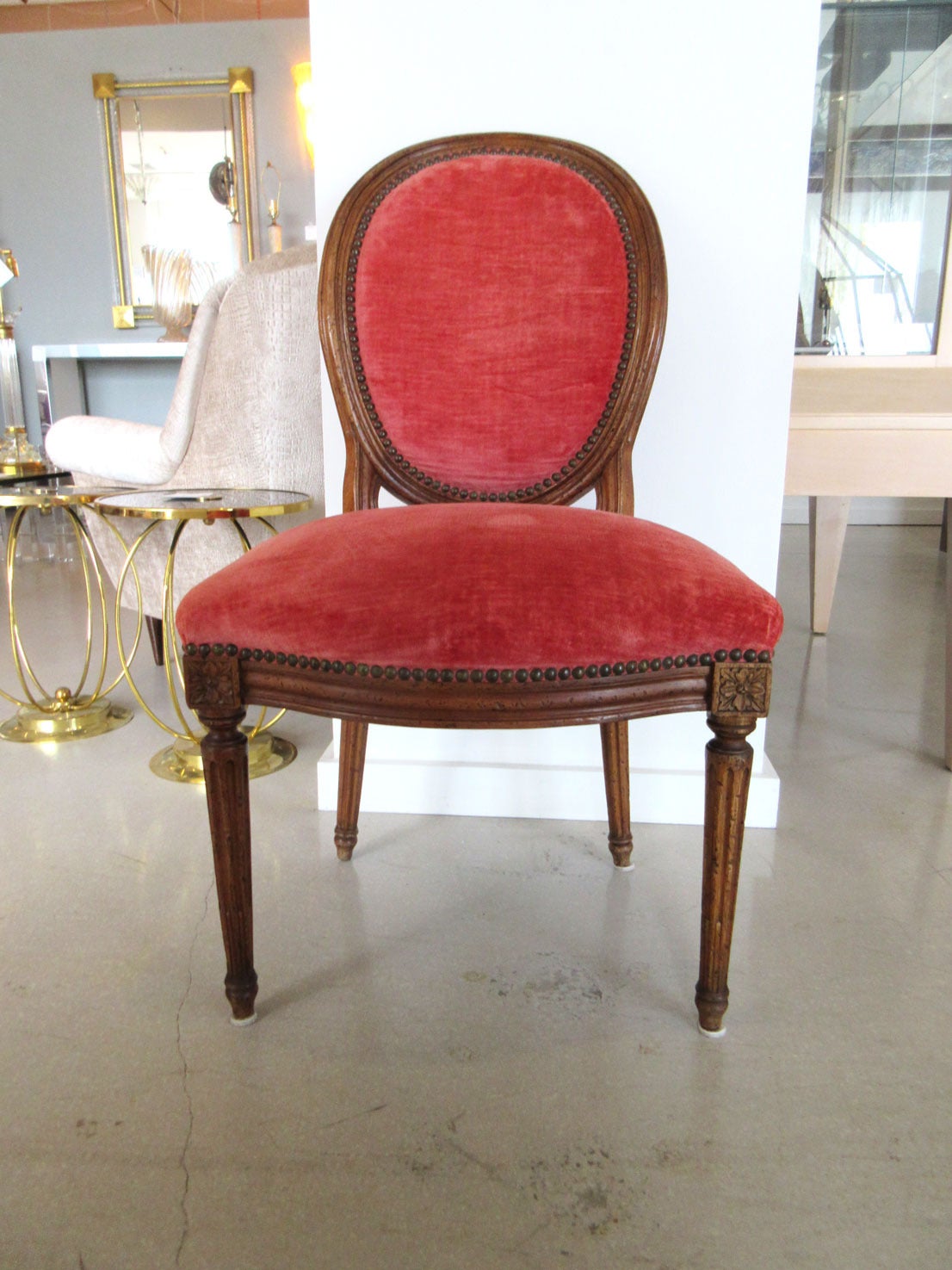 Large set of 12   oval back dining room chairs in the style of Louis XVI-- with coral color upholstery.