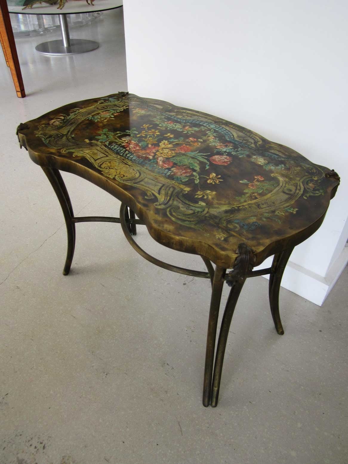Small single Laverne table featuring a colorful and detailed top in the style of 