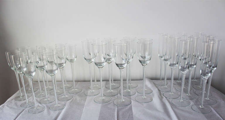 Three groups of stemware -- each comprising set of 10 plus a couple spares.
The champagne glasses are:
overall 11.6