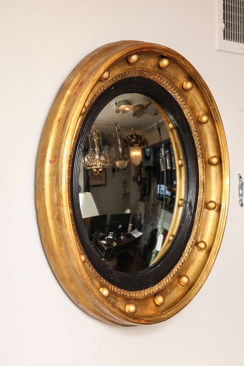 British An English Regency Bulls Eye Mirror