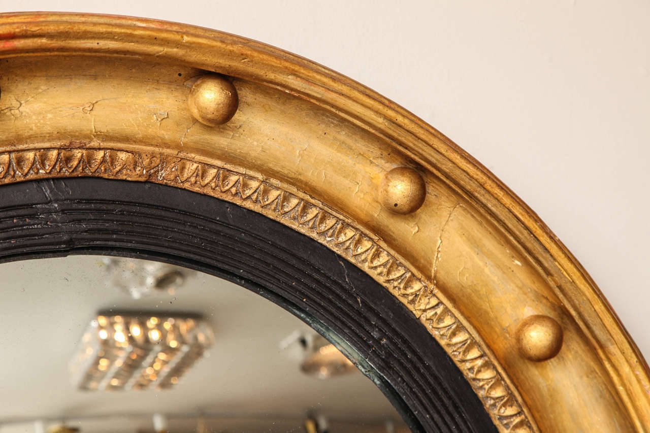 An English Regency Bulls Eye Mirror In Excellent Condition In New York, NY