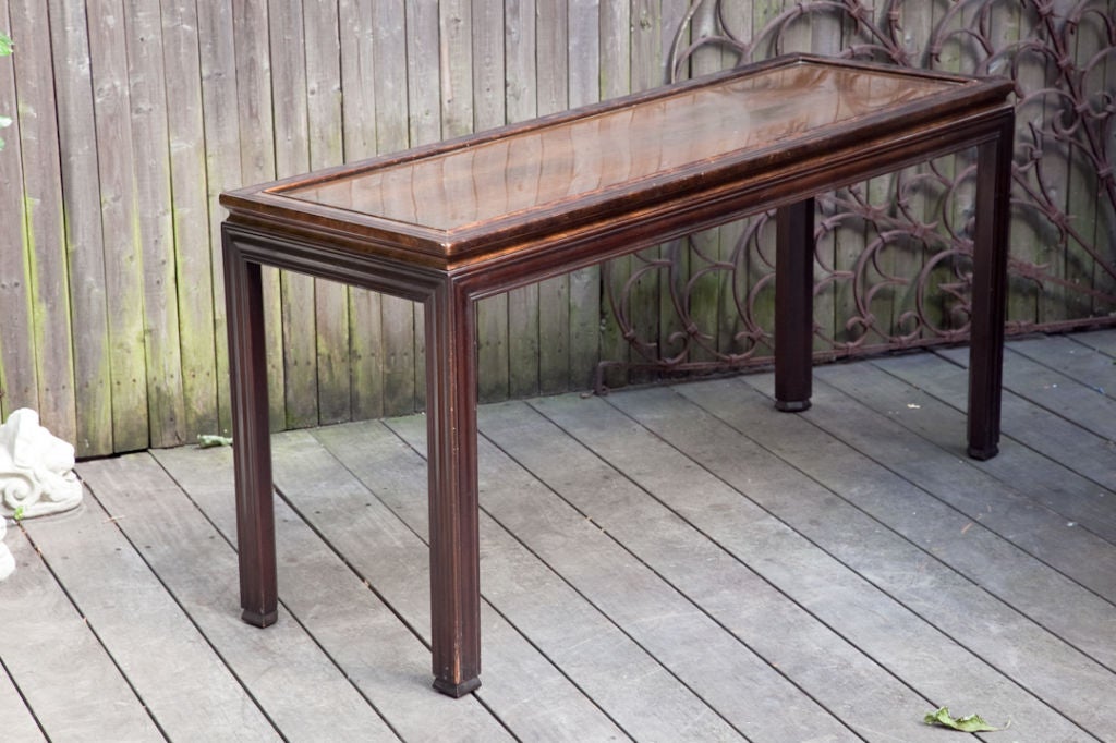 An Asian Inspired Sofa Table with Carved Walnut Frame