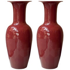 A Pair of Palace Size Chinese Sang De Boeuf Vases
