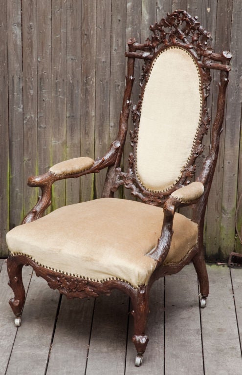 An Austrian Black Forest Open Armchair with Walnut Frame In Excellent Condition In New York, NY