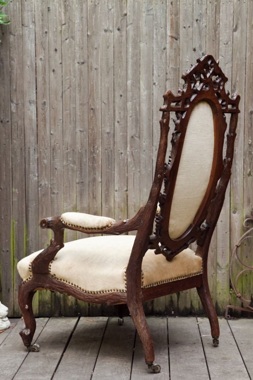 An Austrian Black Forest Open Armchair with Walnut Frame 2