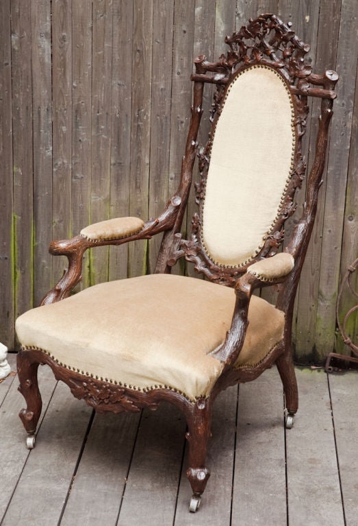 An Austrian Black Forest Open Armchair with Walnut Frame 4